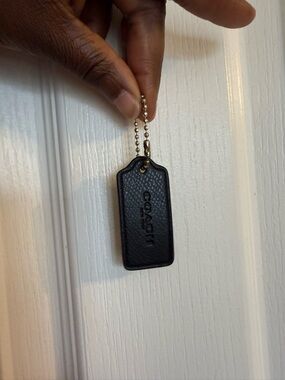 Coach Black Textured Leather Tag